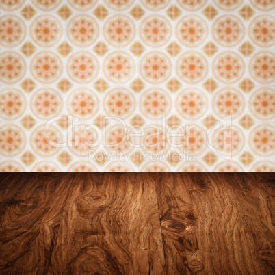 Wood table top and blur vintage ceramic tile pattern wall