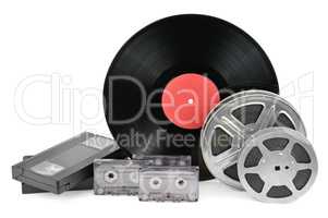 vinyl record, video and audio cassettes isolated on white backgr