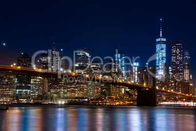 Manhattan and the Brooklyn Bridge. Evening