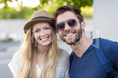 Hip couple posing for camera