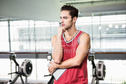 Thoughtful man with chin on fist