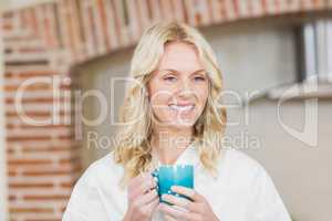 Pretty woman having a cup of coffee