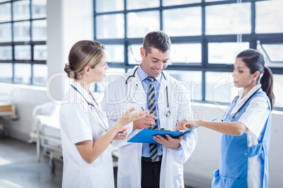 Medical team standing and talking