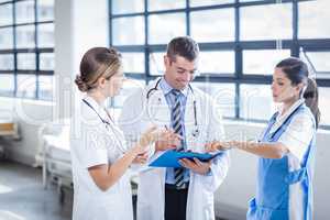 Medical team standing and talking