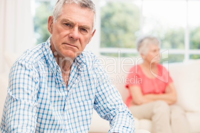 Upset senior man after arguing with wife