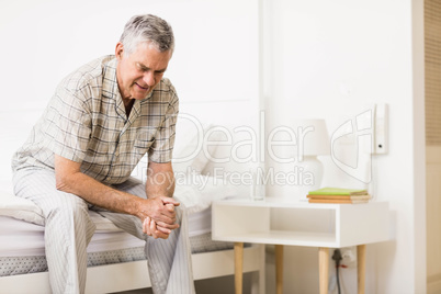 Suffering senior man waiting