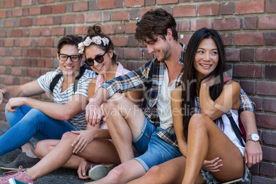 Hip friends sitting on the floor