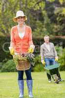 Cute couple doing some gardening