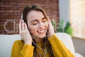 Pretty woman listening music