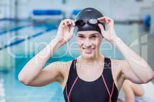 Smiling swimmer looking at the camera