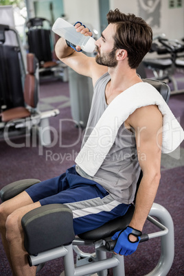 Handsome man drinking water