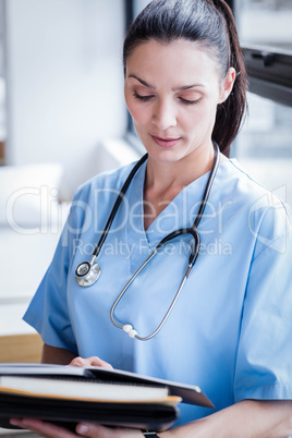 Nurse writing in her diary