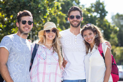 Hip friends smiling at the camera