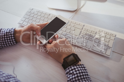 Close up view of businesswoman using her phone