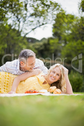 Happy couple having a picnic