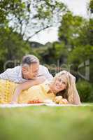 Happy couple having a picnic