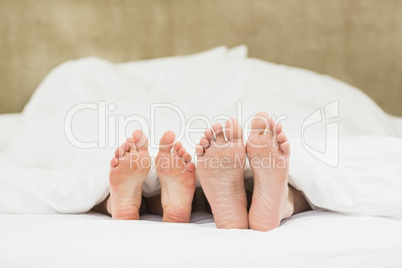 Close up of couples feet