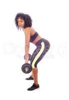 African American woman weight lifting.