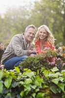 Cute couple looking at flowers