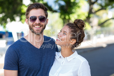 Hip couple posing for the camera