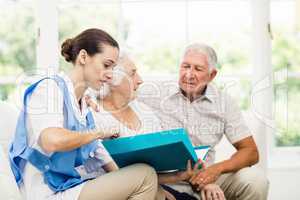 Nurse taking care of sick elderly patients