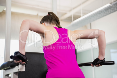 Fit woman doing pull up