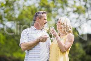 Happy couple toasting with champagne