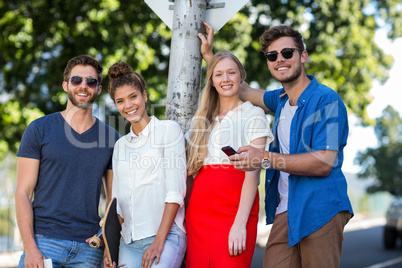 Hip friends smiling at the camera