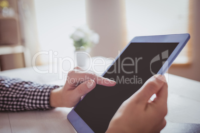 Businesswoman using her tablet