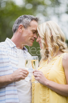 Happy couple drinking champagne