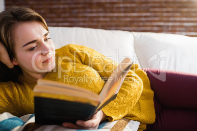 Pretty woman reading a book