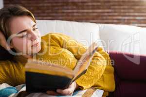 Pretty woman reading a book