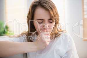 Pretty woman coughing