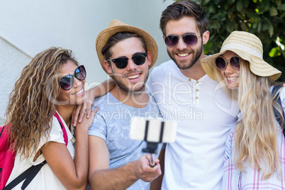 Hip friends taking selfie