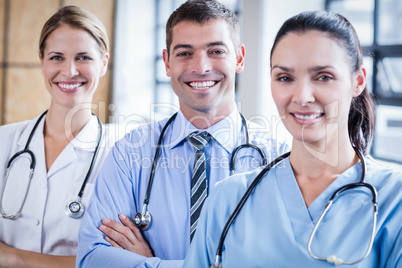 Medical team smiling at camera together Medical team smiling at camera together