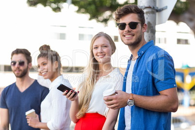 Hip friends smiling at the camera