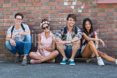 Hip friends sitting on the floor