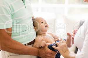 Senior man playing with his grandson