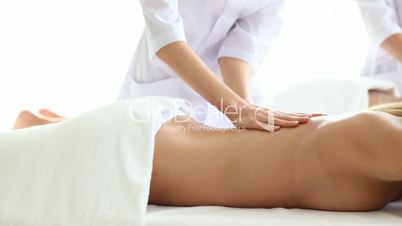Two women getting massage