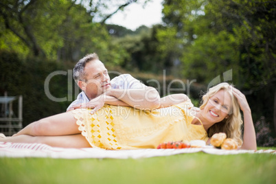 Happy couple having a picnic