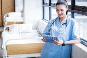 Nurse using her tablet pc