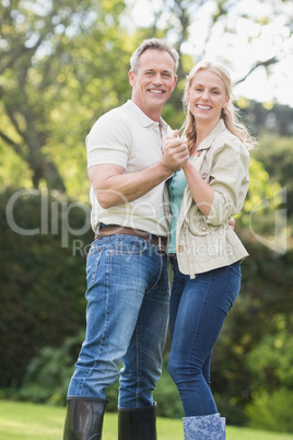 Cute couple dancing and holding hands