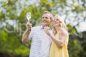 Happy couple toasting with champagne