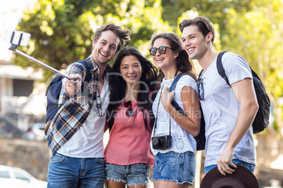 Hip friends taking selfie