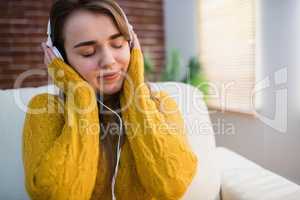 Pretty woman listening music