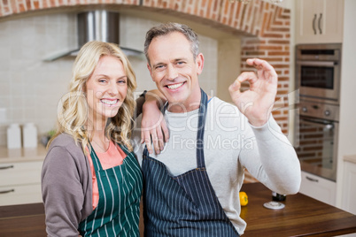 Cute couple doing positive gesture