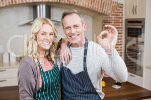 Cute couple doing positive gesture