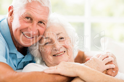 Cute senior couple hugging