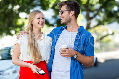 Hip couple laughing together