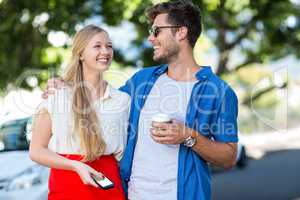 Hip couple laughing together